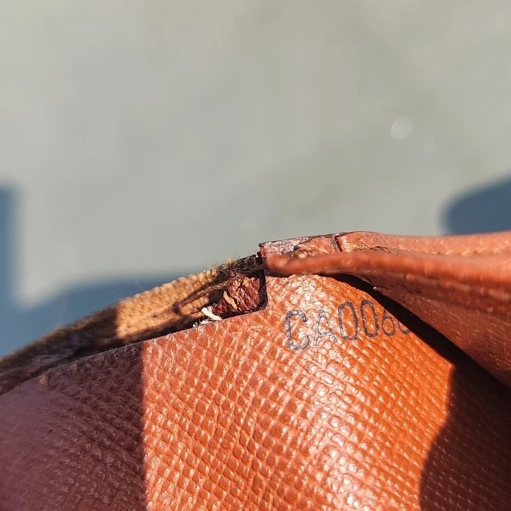 Authentic Louis Vuitton kisslock wallet